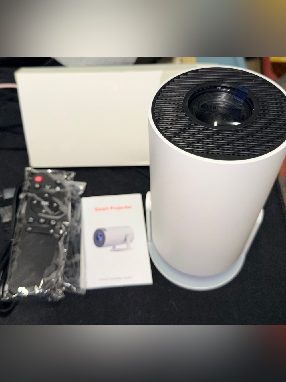 Minimal White Cylindrical Portable Projector